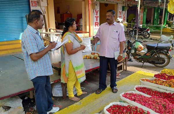 Interaction with flower seller_Value Chain Analysis and Market Linkages in three districts of Karnataka state, UNDP
